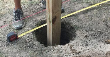 comment fixer un poteau bois au sol