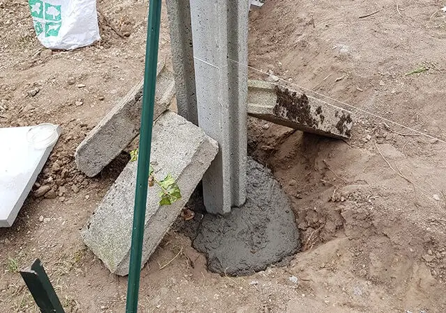 Combien de beton pour sceller un poteau